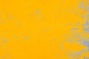 Yellow cement or concrete wall texture and background.